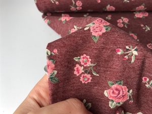 Bomuldsjersey - flotte blomster på bordeaux meleret bund
